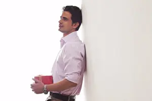Facial Expression Prints: Man with a gift leaning against wall