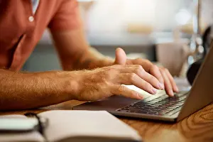 Texting Prints: Man, hands and typing on laptop for email