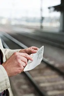 Only Mature Men Prints: A man at a platform of a railway station, Sweden