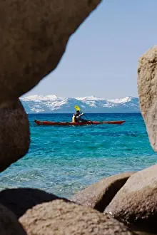 Difficult Prints: A man sea kayaking on Lake Tahoe near Incline Village in Nevada