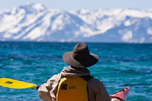 Difficult Prints: A man sea kayaking on Lake Tahoe near Incline Village in Nevada