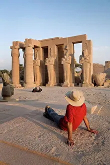 Global Prints: Man sitting at Temple in Luxor