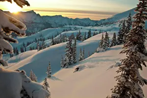 Gear Prints: A man skiing deep powder while backcountry skiing at Sol Mountain