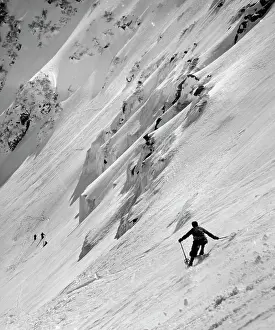On The Move Prints: Man skiing on slope