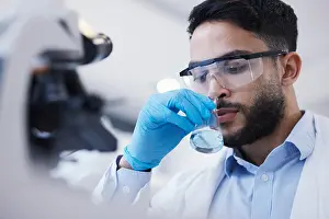 Analysis Prints: Man, smell or scientist with liquid to research for a test analysis