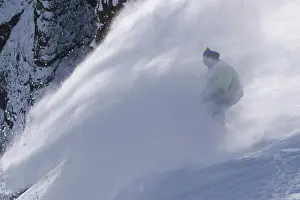 Sportsmen Prints: A man snowboarding powder snow on a windy day at Kirkwood ski resort in California