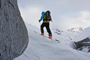 Boarding Prints: A man splitboarding in Fairy Meadows, Selkirks, BC