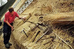 Work Tool Prints: Man thatching a roof, thatching tools