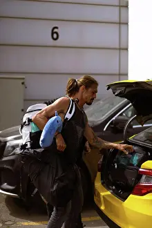 Positive Emotion Prints: Man traveler packing the car with suitcases