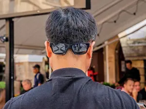 Amuse Prints: Man wearing sunglasses on back of head in Prague in the Czech Republic