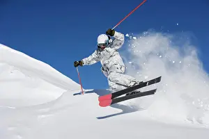 Thrill Prints: Man in white & grey camo suit off-piste