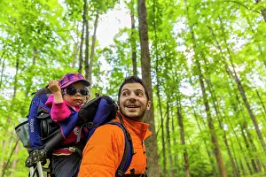 Model Release Prints: A man and his young daughter explore the woods in Epping, New Hampshire. (MR)