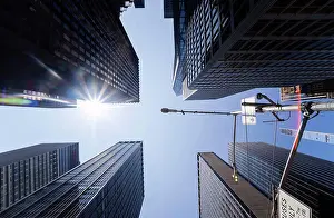 Skyscraper Prints: Manhattan skyscrapers on a sunny summer afternoon from directly below, New York City