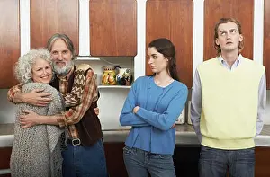 Tooth Prints: Mature Family in Kitchen