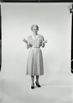 Full Length Prints: Mature woman smiling and gesturing