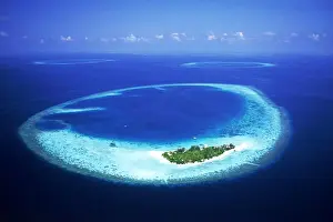 Pure Prints: Mayafushi Island with encircling reef in Maldive Islands and Indian Ocean