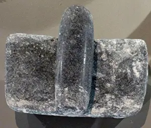 Mayan Prints: Mayan burial artefacts included this stone and grinder for corn found in a grave at Zayosal