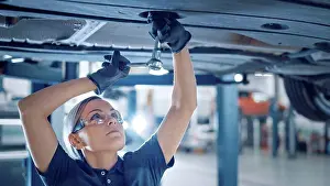 Maintenance Prints: Mechanic working on car