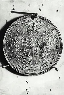 1937 Prints: One of the medals issued to public school children during the coronation of King George V & Queen Mary in 1911