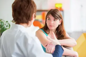 Converse Prints: Medical consultation, Doctor talking with a female patient