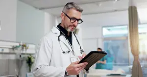 Schedule Prints: Medical, doctor and typing on tablet at clinic for Telehealth consultation