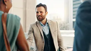 Property Prints: Meeting, smile and handshake with business man in city for real estate developer