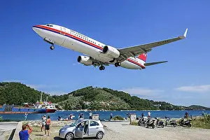 Dangerous Prints: A Meridiana Boeing 737-800 aircraft with registration EI-FFK lands at Skiathos airport