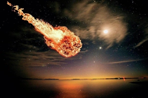 Outer Space Prints: Meteor falling through starry night sky over water