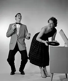 Arts Culture And Entertainment Prints: Mid adult couple dancing