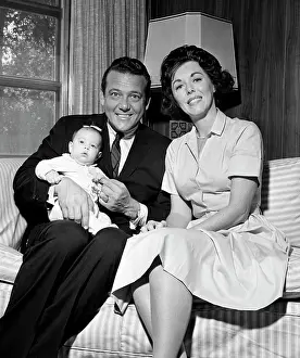 Mid adult happy parents with baby girl