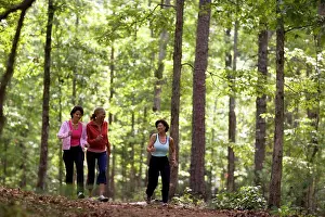 Conversation Prints: Middle aged women walking in forest