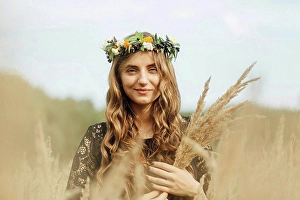 Light Hearted Prints: Middle Eastern woman wearing flower crown holding wheat
