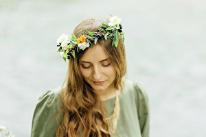 Garland Prints: Middle Eastern woman wearing flower crown looking down