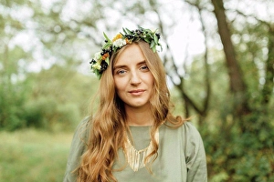 Light Hearted Prints: Middle Eastern woman wearing flower crown in woods