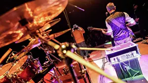 System Prints: Milan, italy 2 april 2025: musicians playing their instruments on a stage during a live rock concert