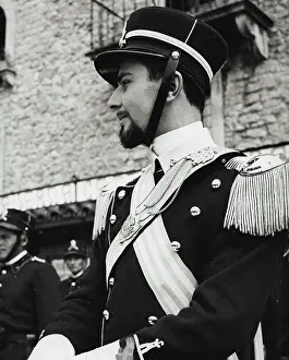1955 Prints: Military polish personified is this Lieutenant of the little army of the republic of San Marino
