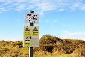 Dangerous Prints: Military training area warning sign at Braunton Burrows on the North Devon Coast