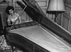 Instrument Prints: Millicent Silver at the harpsichord which cost £1