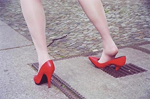 Joke Prints: Misfortune, woman gets stuck in a hole with high heels, Berlin, Germany, Europe