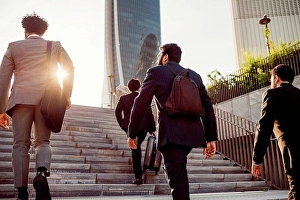 Stairway Prints: Mixed race group of businessmen hanging out together in town