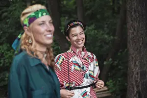 Kindness Prints: Mixed race women bohemian fashion in forrest together smiling