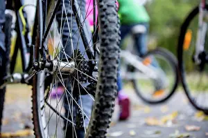 Bicycle Prints: MODEL RELEASED. Family cycling together in autumn
