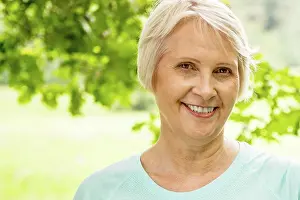 Senior Adult Prints: MODEL RELEASED. Portrait of senior woman outdoors