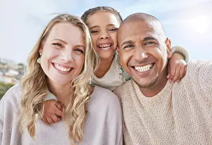 Mom, dad and girl in portrait with diversity