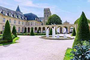 Blossoms Prints: Monastery garden with arcade and view of the monastery buildings of the Abbaye aux Dames