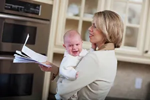 Paperwork Prints: mother with baby stressing over household bills, jordan ontario canada