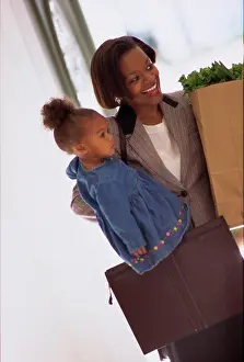 Tilt Prints: Mother carrying her daughter and holding shopping bags