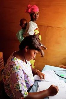 Physician Prints: Mother and her child suffering from malnutrition in medical consultation