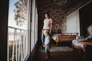1 2 Years Old Prints: Mother and child in vintage bedroom with flower wallpaper
