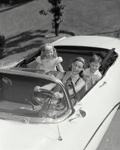 Shoulders Prints: Mother and children sitting in car